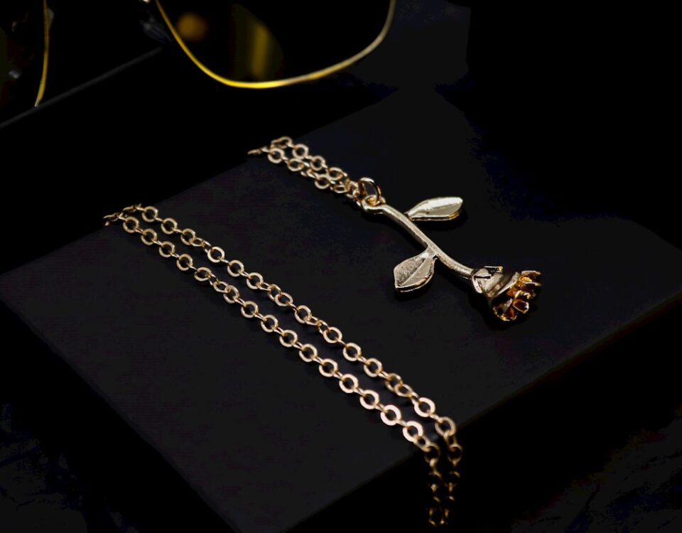 A pair of glasses sitting on top of a black box