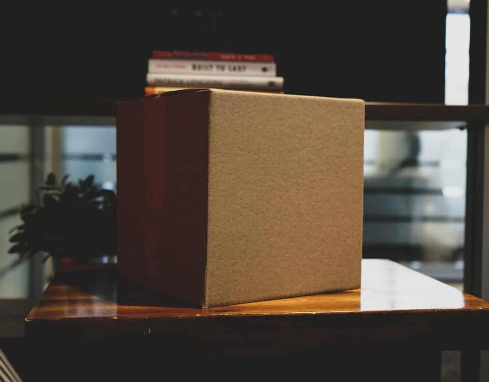 brown box on wooden surface