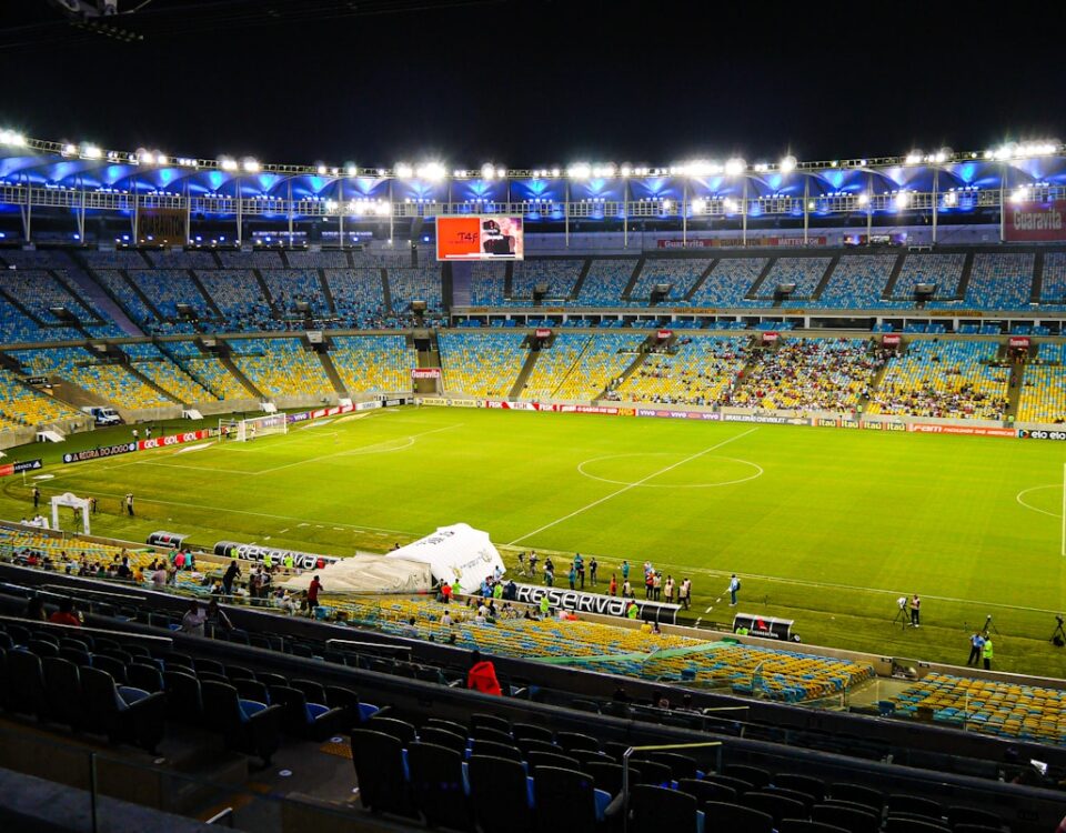 Quando volta o Brasileirão em 2025? a football field with a crowd watching